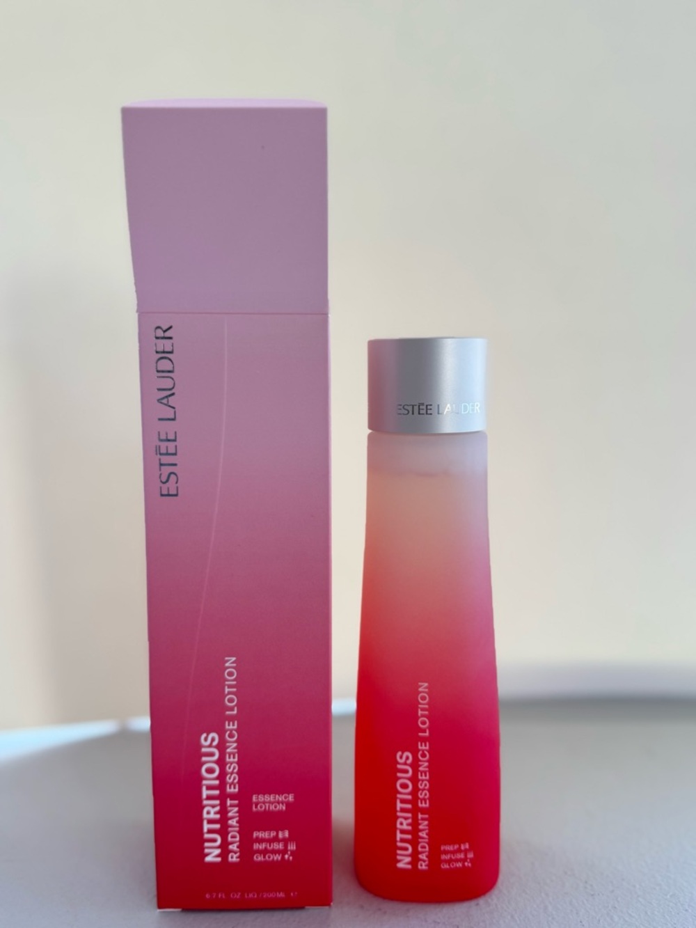 Estee Lauder Nutritious Radiant Essence Lotion - Pink to Red Gradient